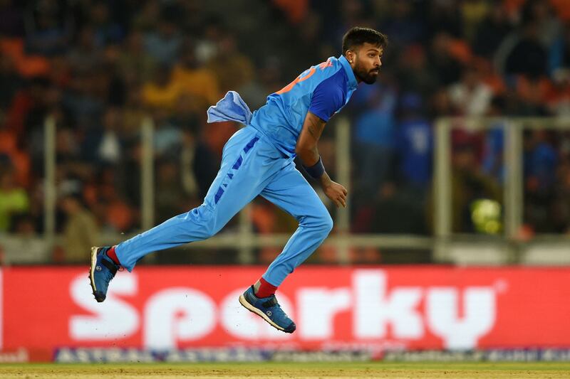 India's Hardik Pandya bowls against New Zealand. AFP