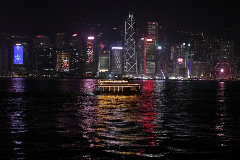 The Hong Kong skyline is lit up on Christmas Eve in Hong Kong, China, December 24, 2019. REUTERS/Lucy Nicholson