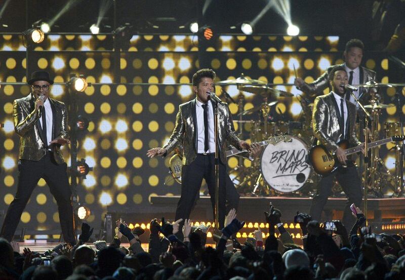 Bruno Mars performs performs during the halftime show at the Super Bowl on Sunday. Bill Kostroun / AP 
