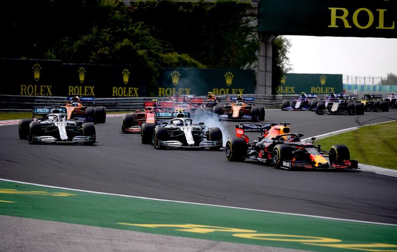 Verstappen leads at the start of an action packed race. EPA