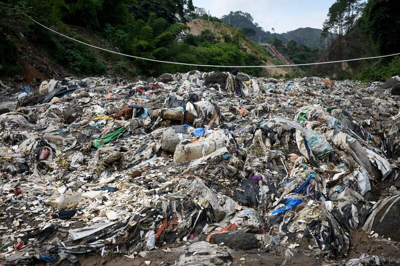 Piles of rubbish on the banks of the polluted Las Vacas river, in Chinautla, Guatemala. Dutch NGO The Ocean Cleanup will install a giant metal fence called an 'interceptor', to catch thousands of tonnes of plastic waste generated in Guatemala City to prevent it from flowing into the Caribbean Sea. AFP