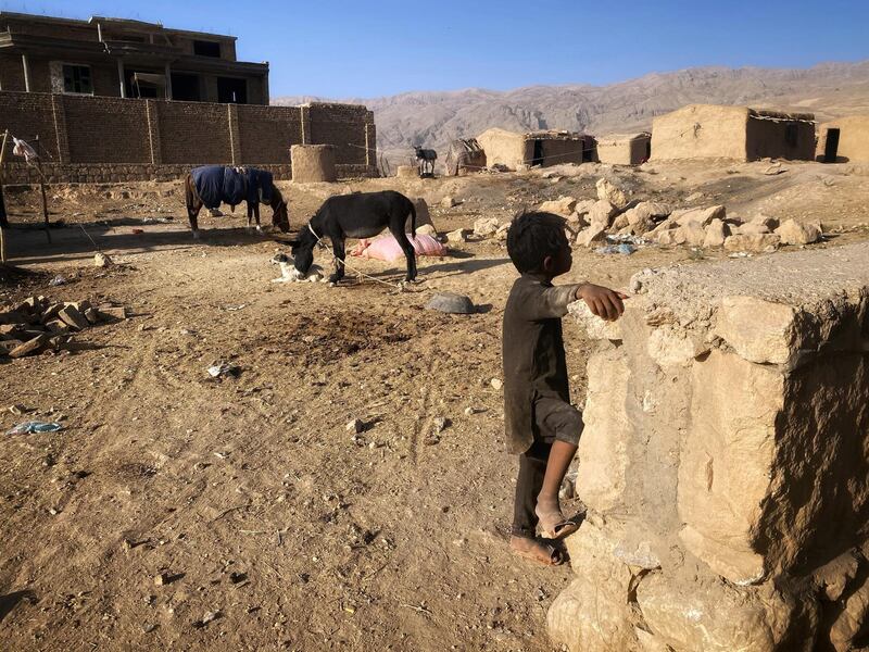 A jogi child plays outside his house in the tribal village in Aybak city of northern Samangan province. Lack of national identity has deprived many Jogi children of education opportunities, pushing them further into poverty. Hikmat Noori for The National