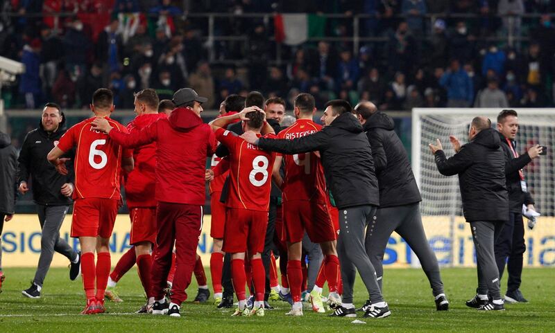 North Macedonia players celebrate after the match. Reuters