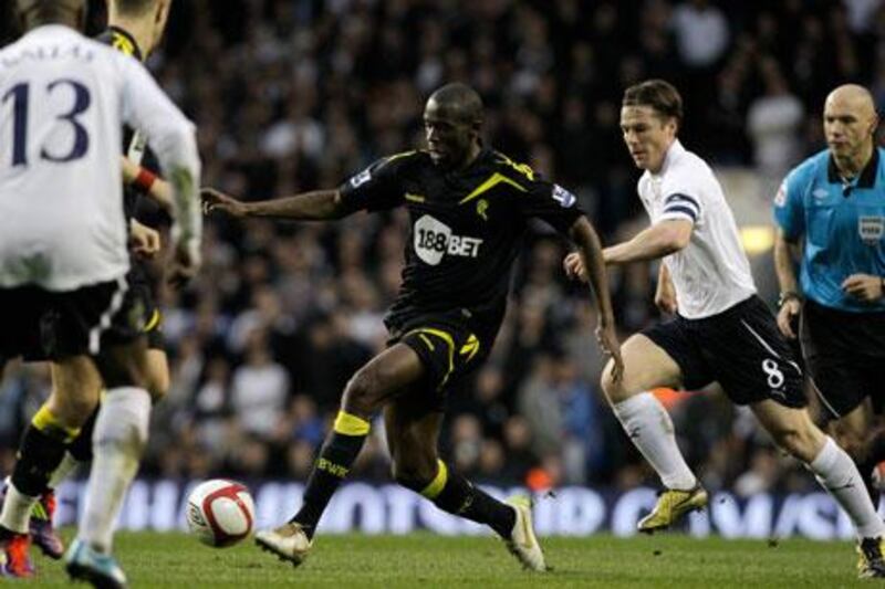 Fabrice Muamba, centre, suffered a heart attack during an FA Cup match between Bolton and Tottenham on Saturday.