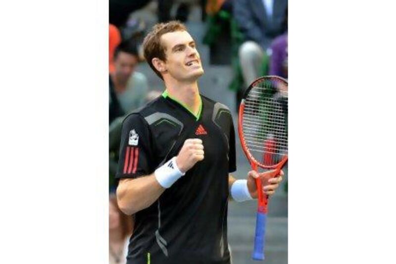 Andy Murray celebrates beating Rafael Nadal in Japan on Sunday for his second title in two weeks.