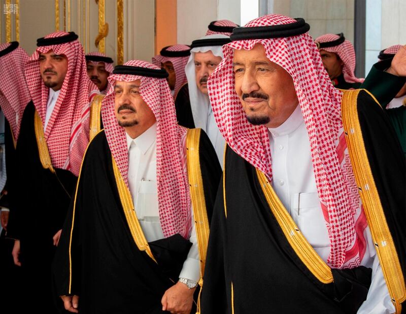 In this photo provided by the Saudi Press Agency, SPA, Saudi King Salman, right, with dignitaries before he gives his annual policy speech at the consultative Shura Council, Monday, Nov. 19, 2018, Riyadh, Saudi Arabia. Salman gave his first major speech since the killing of journalist Jamal Khashoggi by Saudi agents, expressing support for his son, the crown prince, and making no mention of the accusations that the prince ordered the killing. Mondayâ€™s speech highlighted the kingdomâ€™s priorities for the coming year, focusing on issues such as the war in Yemen, security for Palestinians, stability in the oil market, countering rival Iran and job creation for Saudis.  (AP Photo/Saudi Press Agency)