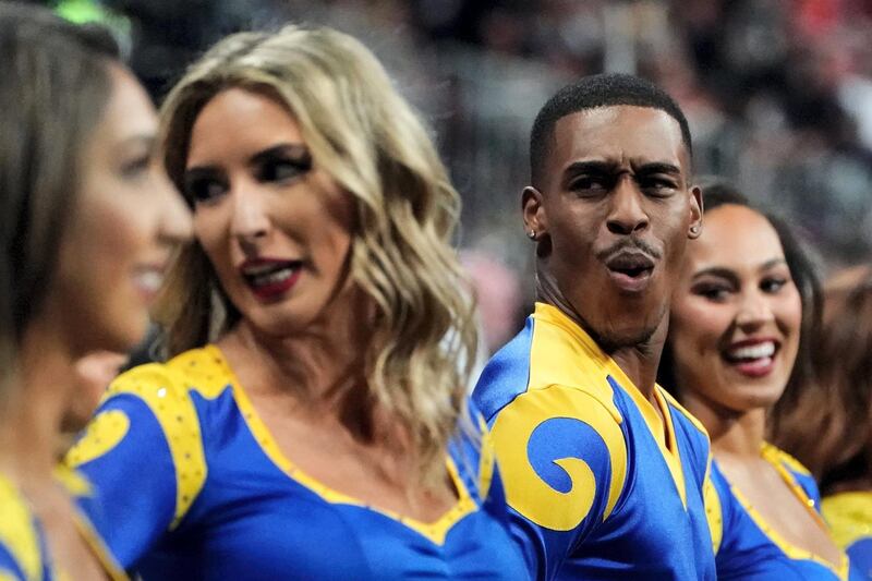 Rams cheerleader Quinton Peron reacts during Super Bowl LIII between the New England Patriots and the Los Angeles Rams at Mercedes-Benz Stadium in Atlanta, Georgia, on February 3, 2019. (Photo by TIMOTHY A. CLARY / AFP)