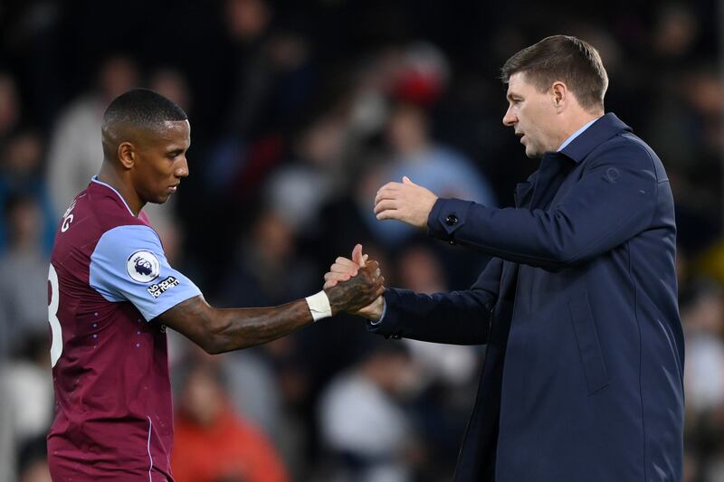 Steven Gerrard shakes hands with Aston Villa player Ashley Young at the final whistle. Getty Images