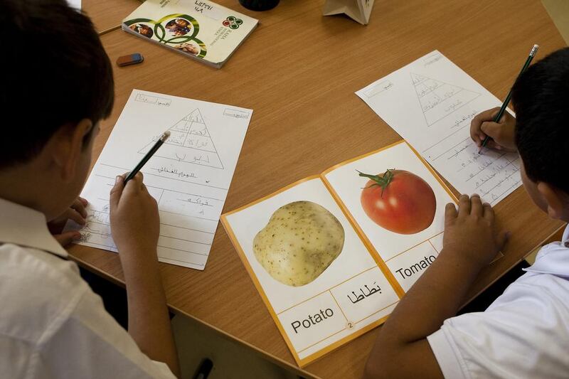 Pupils at Raha International School in Abu Dhabi learn Arabic from flash cards. Andrew Henderson / The National