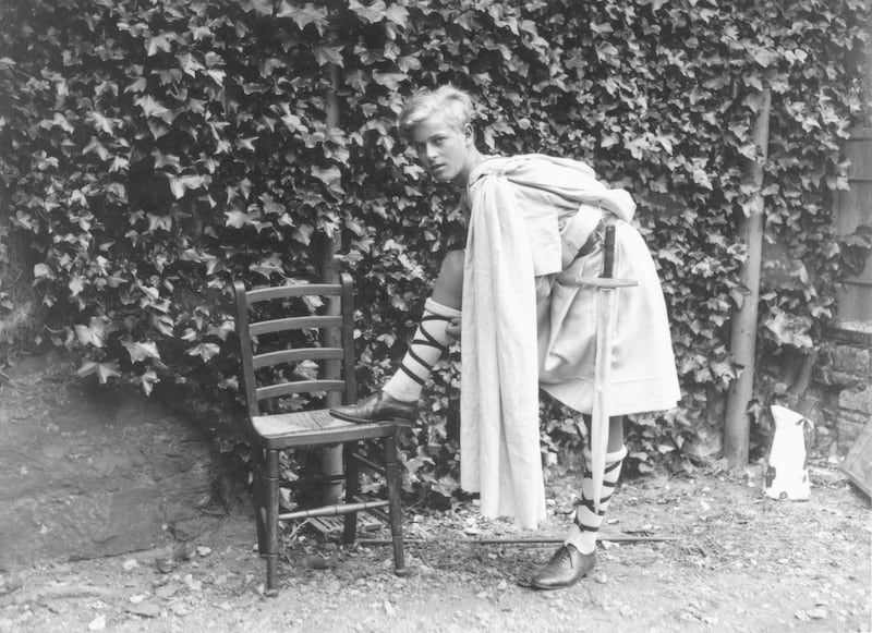 July 1935:  Prince Philip of Greece dressed for the Gordonstoun School's production of 'MacBeth', in Scotland.  (Photo by Fox Photos/Getty Images)