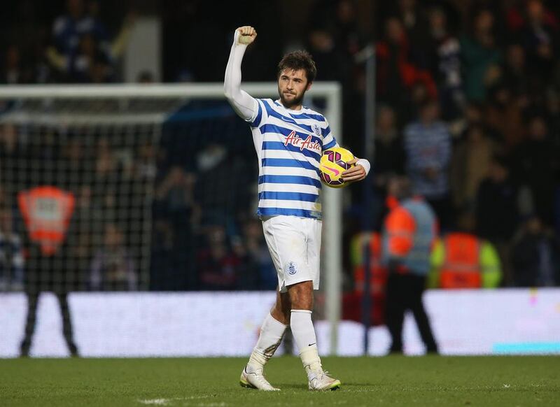 Charlie Austin of Queens Park Rangers celebrates victory after his three goals helped lead QPR past West Bromwich Albion at Loftus Road on December 20, 2014 in London, England. Scott Heavey / Getty Images