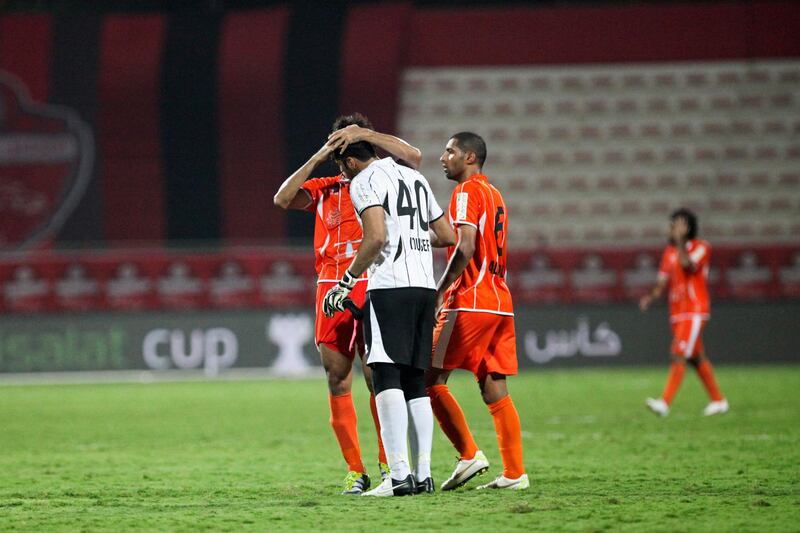 Dubai, UAE, October 14, 2012:

Dubai and Ajman faced off tonight in the Etisalat Cup. Ajaman , in the end, was victorious, 2-1, after a very sloppy first half. 

Ajman's players celebrate after eeking out a win against Dubai's Al Ahli squad.

Lee Hoagland/The National
