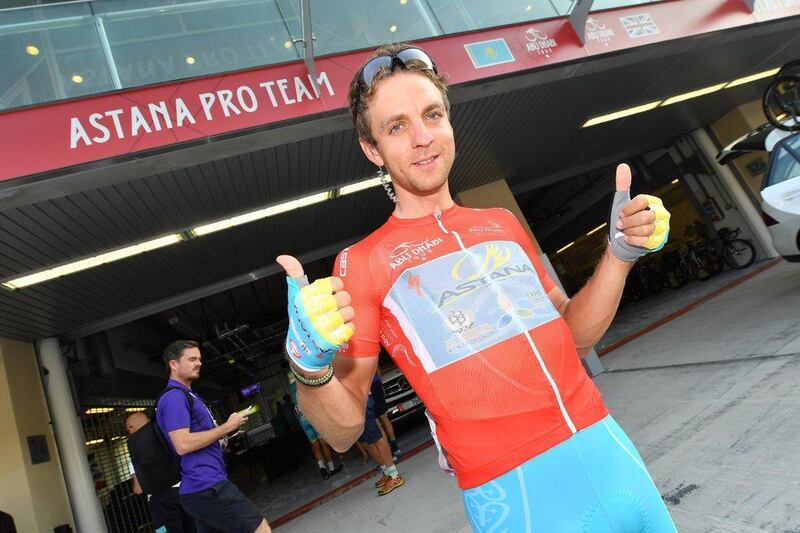 Tanel Kangert of Team Astana team wearing the red jersey poses for photographers prior the start of the stage. Luca Zennaro / EPA