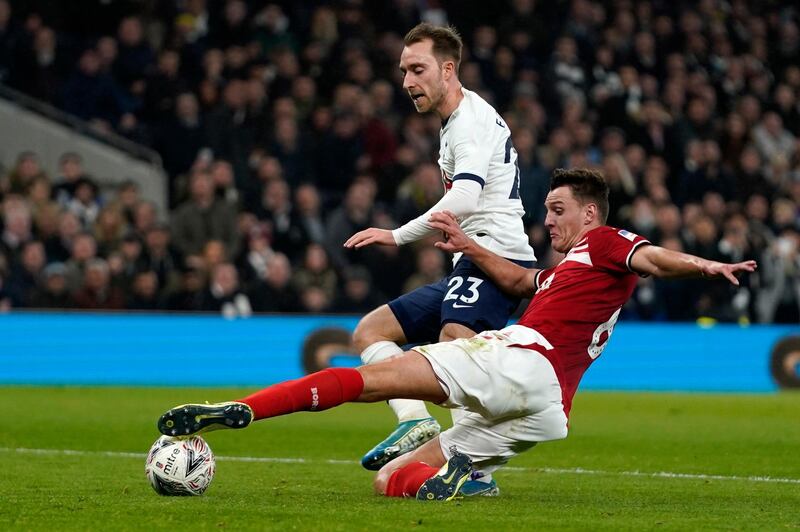 Tottenham's Christian Eriksen vies for the ball against Middlesborough's Dael Fry. EPA