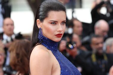 TOPSHOT - Brazilian model Adriana Lima arrives for the screening of the film "Oh Mercy ! (Roubaix, une Lumiere)" at the 72nd edition of the Cannes Film Festival in Cannes, southern France, on May 22, 2019. / AFP / Valery HACHE