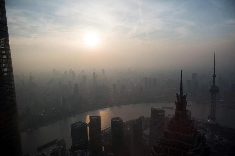 The Shanghai skyline during a polluted day. Johannes Eisele / AFP Photo