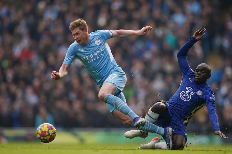 Kevin De Bruyne shrugs off N'Golo Kante on his way to scoring the opening goal. AP