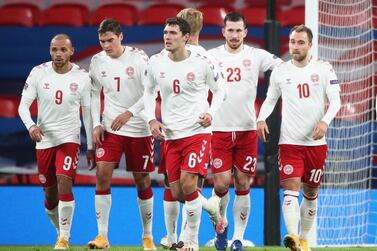 Soccer Football - UEFA Nations League - League A - Group 2 - England v Denmark - Wembley Stadium, London, Britain - October 14, 2020 Denmark's Christian Eriksen celebrates scoring their first goal with teammates Pool via REUTERS/Nick Potts