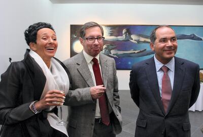 MOSCOW, RUSSIA. JANUARY 16. Painter Aidan Salakhova, Alfa-Bank‚Äôs President Pyotr Aven and the Federation Coulcil member, Farkhad Akhmedov (L-R) appear at Tair Salakhov's exhibition in the Yekaterina Cultural Foundation. (Photo ITAR-TASS / Igor Kubedinov/TASS via Getty Images)