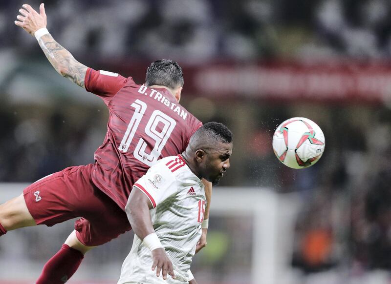 Al Ain, United Arab Emirates - January 14, 2019: Capt Ismail Al Hammadi of UAE battles with Tristan Do of Thailand during the game between UAE and Thailand in the Asian Cup 2019. Monday, January 14th, 2019 at Hazza Bin Zayed Stadium, Al Ain. Chris Whiteoak/The National