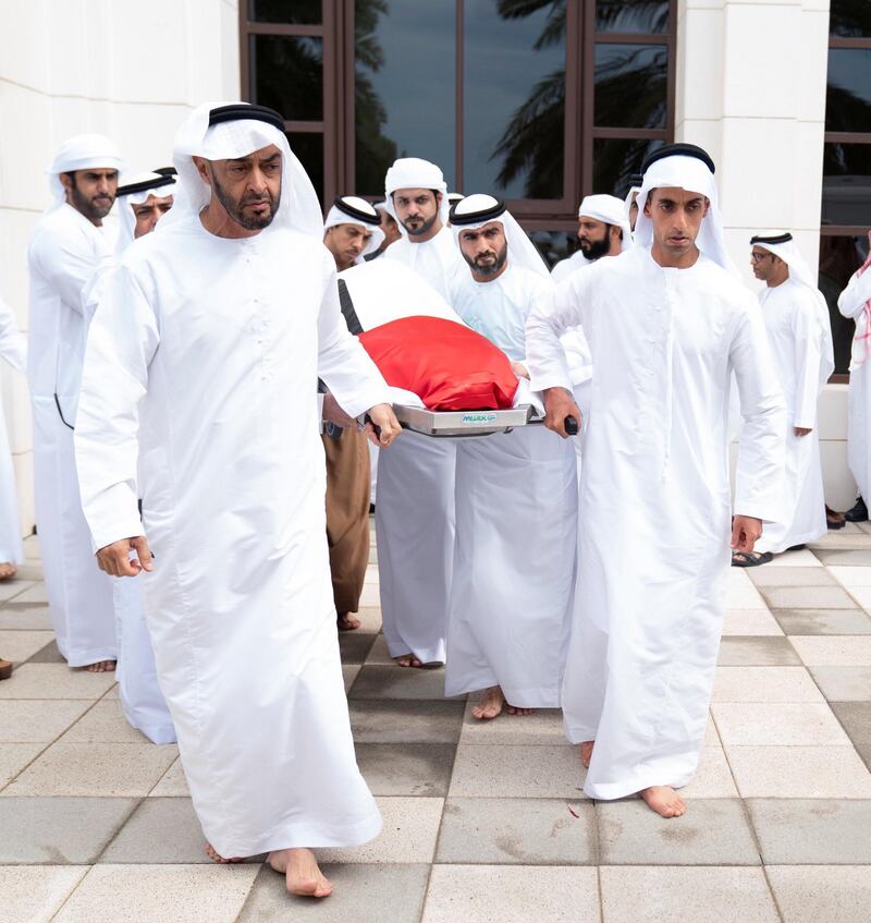 Sheikh Mohamed bin Zayed, Crown Prince of Abu Dhabi and Deputy Supreme Commander of the UAE Armed Forces, helps carry the body of his brother, Sheikh Sultan bin Zayed, after funeral prayers at  Sheikh Sultan bin Zayed The First Mosque in Al Bateen. Wam