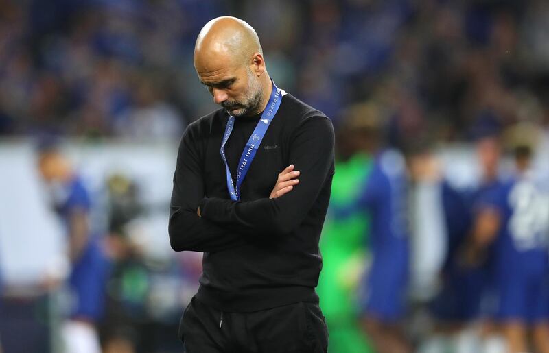 Manchester City manager Pep Guardiola looks dejected after the Champions League defeat against Chelsea in Porto. EPA