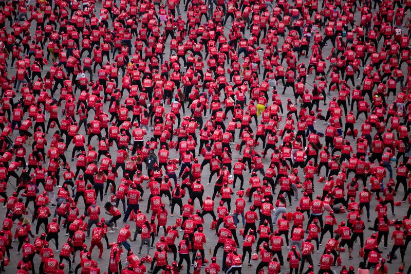 People attend a massive boxing class and try to set a new Guinness World Record for people taking a class at the same time for 30 minutes, in Mexico City. Reuters