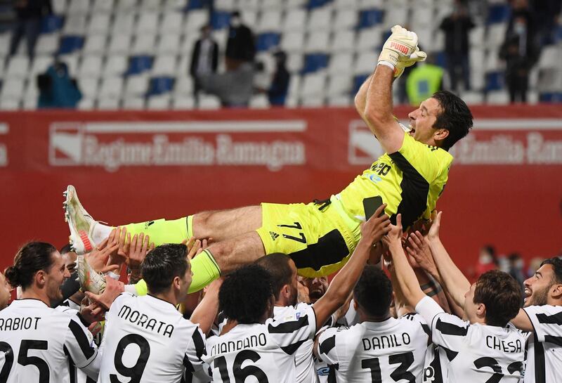 Juventus' Gianluigi Buffon is tossed up by teammates after winning the Coppa Italia. Reuters