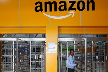 An employee of Amazon walks through a turnstile gate inside an Amazon Fulfillment Centre near Bengaluru, India. The US-India Business Council has drafted a response to Indian government proposals that a regulator is set up to control and share anonymised data, describing it as "tantamount to confiscation of investors' assets". Reuters