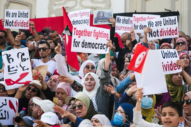 Tunisian demonstrators gather during a protest against Tunisian President Kais Saied in Tunis, Tunisia, Sunday, May 15, 2022. AP