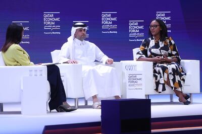 Qatar Airways chief executive, Badr Mohammed al-Meer (centre) and the chief executive of RwandAir, Yvonne Makolo (right), in a panel discussion at the Qatar Economic Forum in Doha. AFP
