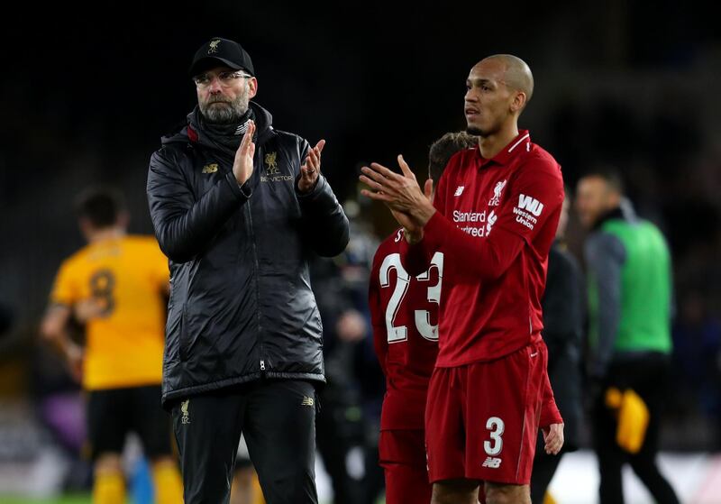 WOLVERHAMPTON, ENGLAND - JANUARY 07: Jurgen Klopp manager of Liverpool and Fabinho of Liverpool applaud after the Emirates FA Cup Third Round match between Wolverhampton Wanderers and Liverpool at Molineux on January 7, 2019 in Wolverhampton, United Kingdom. (Photo by Catherine Ivill/Getty Images)