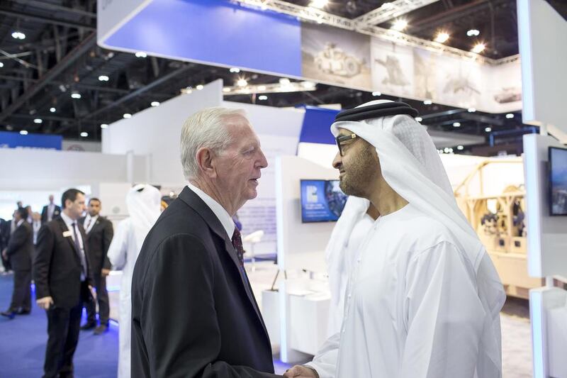 Sheikh Mohammed greets Mike Davis Lockheed Martin’s AEHF vice president during his tour of IDEX. Ryan Carter / Crown Prince Court - Abu Dhabi