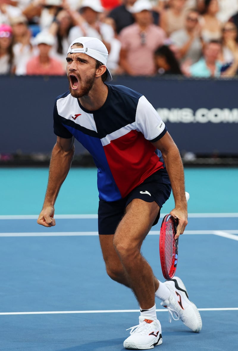 Tomas Machac celebrates his win against Andy Murray at the Hard Rock Stadium. AFP