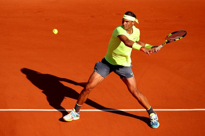 Rafael Nadal plays a forehand from the back of the court. Getty