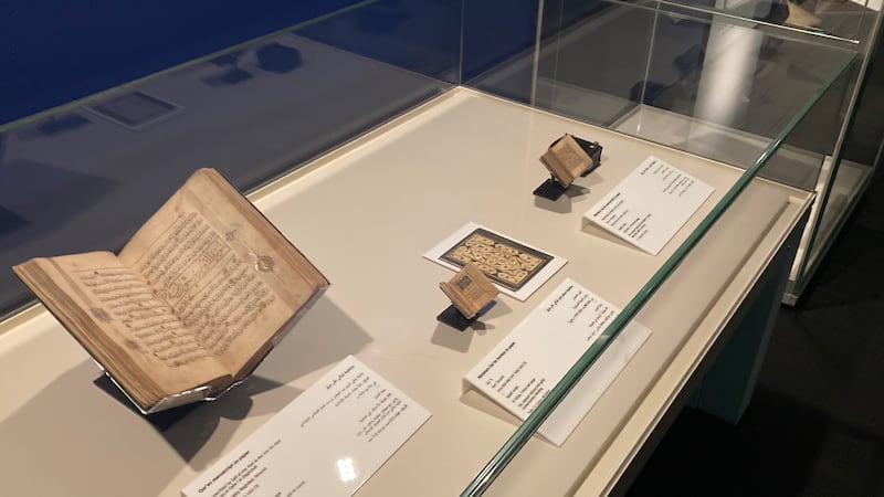 Miniature Qurans displayed alongside their traditionally sized counterparts highlight the precision and skill of the calligraphers. Razmig Bedirian / The National