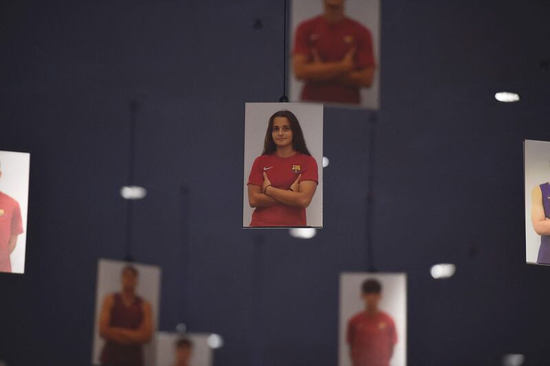 A picture of the Barcelona's women's B team Spanish goalkeeper Laura Coronado hangs in the entrance of La Masia Residence. AFP