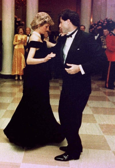 John Travolta recalls that the room cleared for his dance with Princess Diana 