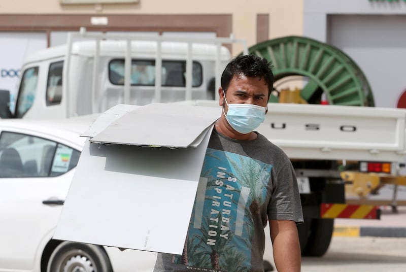 DUBAI, UNITED ARAB EMIRATES , Feb 25– 2020 :- People wearing protective face mask in Al Jadaf area in Dubai. UAE government told residents to wear face mask all the times outside the home whether they are showing symptoms of Covid-19 or not.  (Pawan Singh / The National) For News/Online