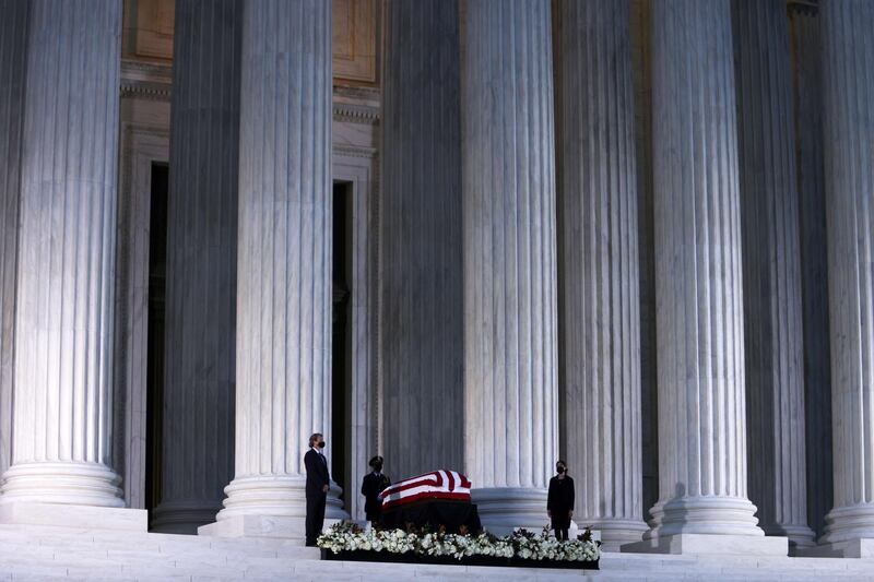 WASHINGTON, DC - SEPTEMBER 23: Members of the public pay respects to Associate Justice Ruth Bader Ginsburg as her flag-draped casket rests on the Lincoln catafalque on the west front of the U.S. Supreme Court September 23, 2020 in Washington, DC. A pioneering lawyer and according the Chief Justice John Roberts 'a jurist of historic stature,' Ginsburg died September 18 at the age of 87 after a long battle against cancer.   Alex Wong/Getty Images/AFP
== FOR NEWSPAPERS, INTERNET, TELCOS & TELEVISION USE ONLY ==
