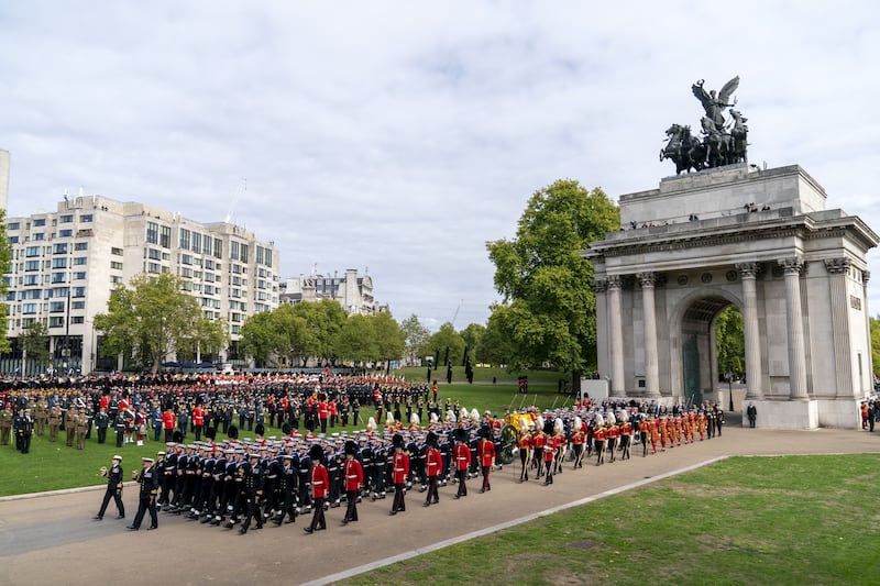 The state gun carriage carrying the coffin of Queen Elizabeth arrives at Wellington Arch during the ceremonial procession following her state funeral. PA