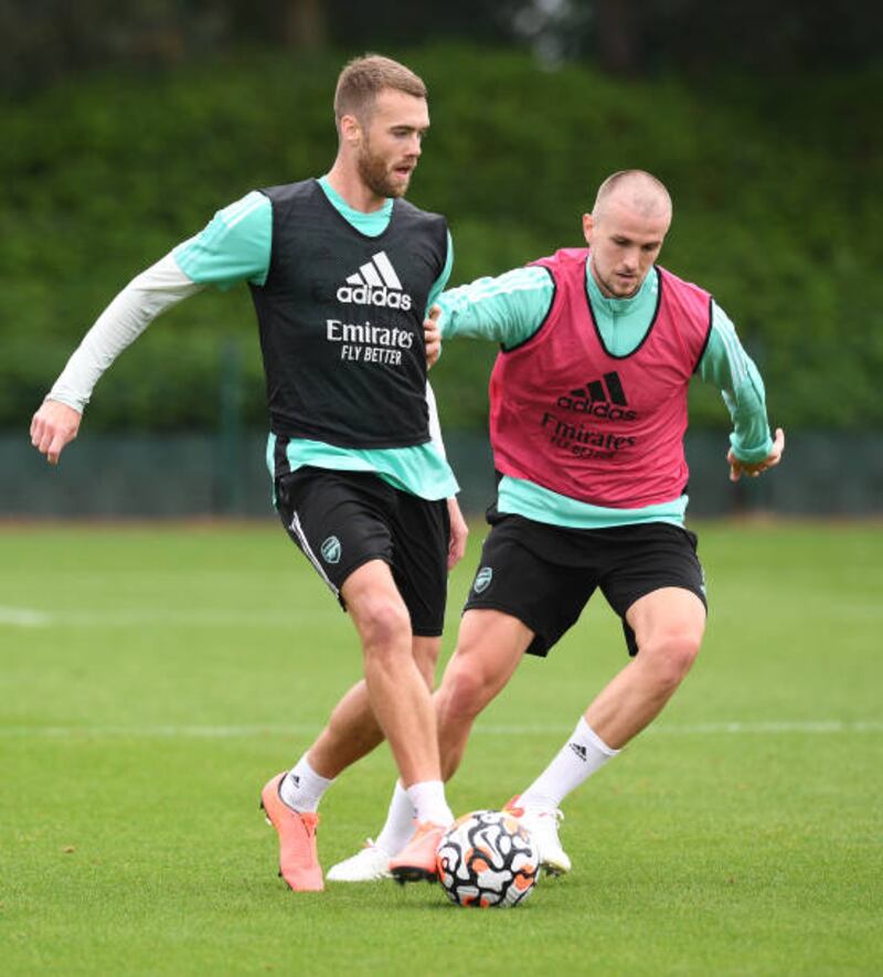 Calum Chambers under pressure from fellow defendeer Rob Holding.