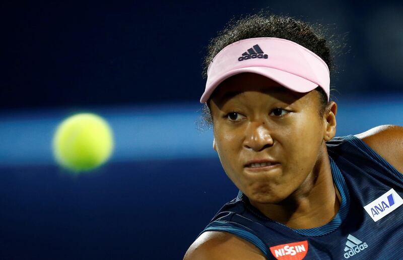 Japan's world No 1 Naomi Osaka in action during her 6-3, 6-3 second-round defeat to Kristina Mladenovic of France at the Dubai Duty Free Tennis Championships on Tuesday night. EPA