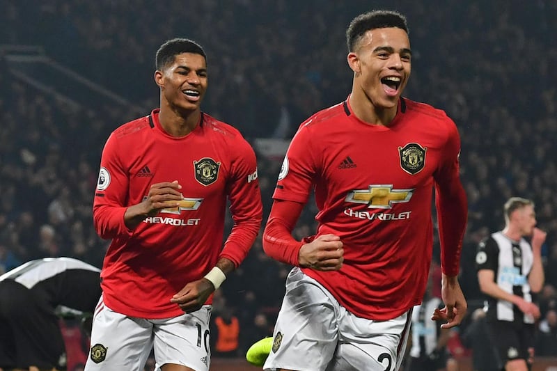 Manchester United's Mason Greenwood, right, celebrates after scoring his team's second goal on Thursday. AFP
