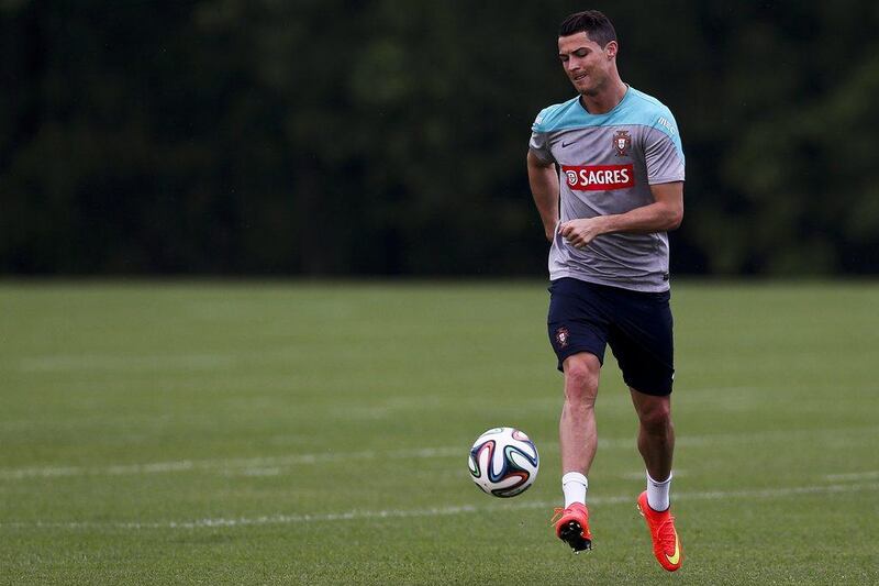 Cristiano Ronaldo shown during a Portugal training session on Tuesday at the facilities of the NFL's New York Jets as he works toward fitness for the 2014 World Cup. Jose Sena Goulao / EPA / June 4, 2014
