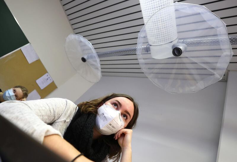 Pupils attend their French lesson in a classroom equipped with a ventilation system developed by scientist Frank Helleis for school classrooms only made from material available at do-it-yourself shops. Reuters