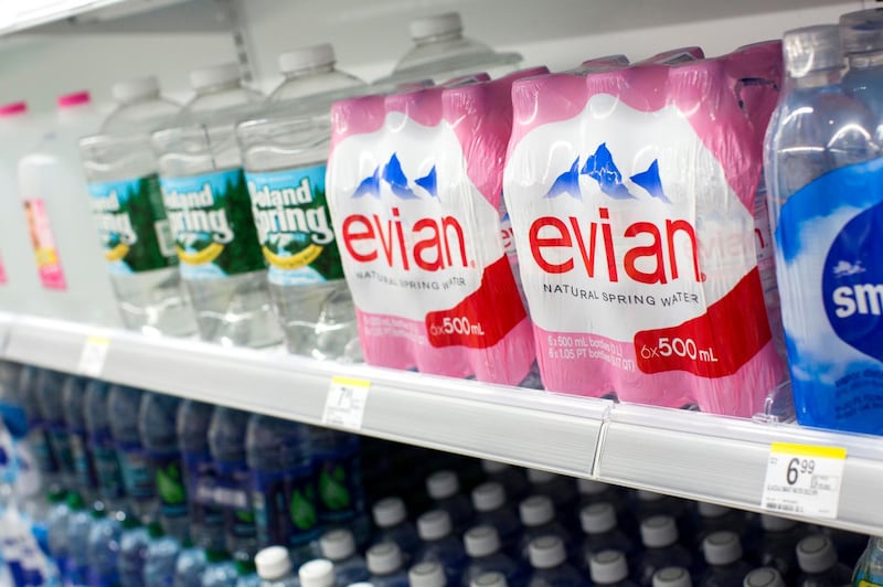 D54DJG Evian and Poland Spring bottled water on display at a Walgreens Flagship store.