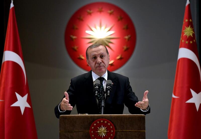 Turkish president Tayyip Erdogan makes a speech during an iftar event in Ankara, Turkey. Yasin Bulbul / Reuters