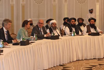 Foreign diplomats and Taliban delegation meet in Qatar's capital Doha on October 12, 2021. AFP