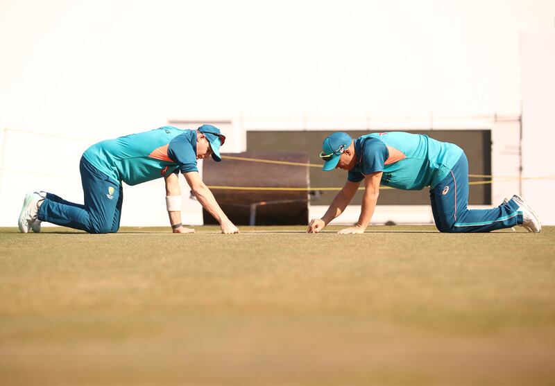 Australia's Steve Smith and David Warner inspect the pitch at the Vidarbha Cricket Association Stadium in Nagpur ahead of the first Test against India. Getty